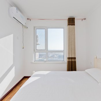 葫芦岛南北通透91平全空调海景日租房可做饭普通公寓酒店提供图片