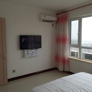 葫芦岛蔚蓝海景公寓酒店提供图片