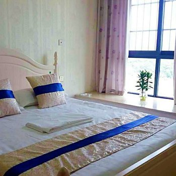 峨眉山市爱e家酒店式家庭公寓(食为天美食街店)酒店提供图片