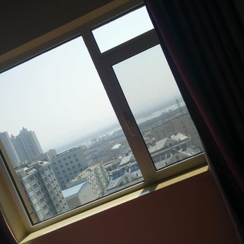 安居家庭连锁公寓(丹东丹建新时代店)酒店提供图片