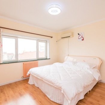 青岛石老人浴场三居室温馨家庭公寓（原石老人温馨家园家庭公寓）酒店提供图片