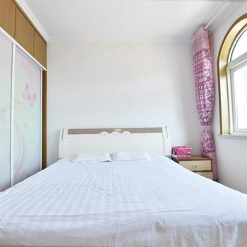 青岛金沙滩喜洋洋家庭公寓酒店提供图片