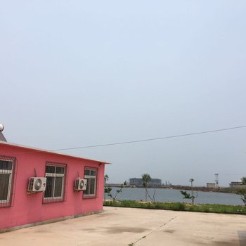 绥中码头渔村酒店提供图片