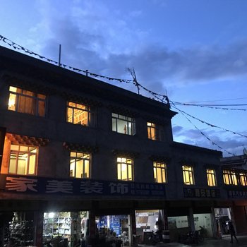 新龙梁昂孜荣大酒店