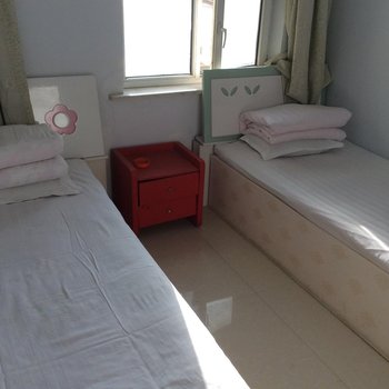 建平休斯盹旅店酒店提供图片