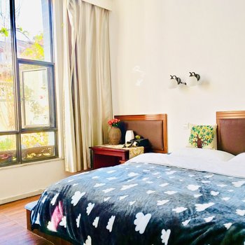 丽江欢乐居掌柜Annie客栈(香格里大道分店)