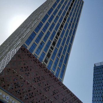 威海凯俊公寓(高铁站韩乐坊美食街店)