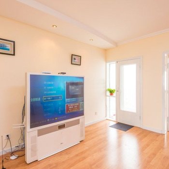 青岛石老人浴场三居室温馨家庭公寓（原石老人温馨家园家庭公寓）酒店提供图片