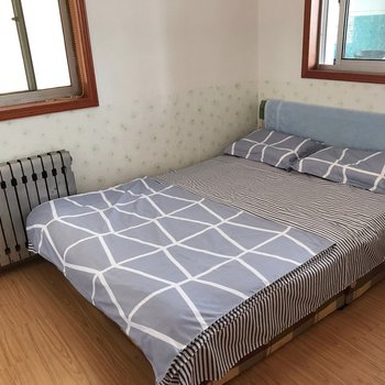 威海温馨的雪儿普通公寓(统一北路店)酒店提供图片