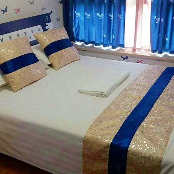 峨眉山市爱e家酒店式家庭公寓(食为天美食街店)酒店提供图片