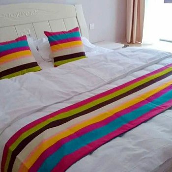 峨眉山市爱e家酒店式家庭公寓(食为天美食街店)酒店提供图片