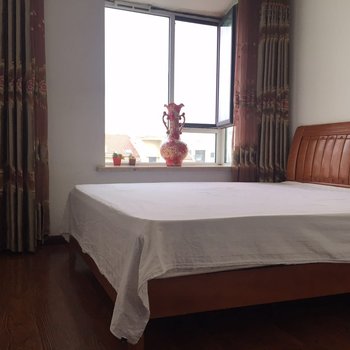 青岛金沙滩假日家庭公寓酒店提供图片