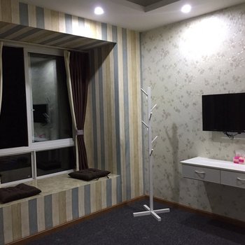 自贡市拾光酒店公寓酒店提供图片