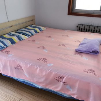 威海温馨的雪儿普通公寓(统一北路店)酒店提供图片