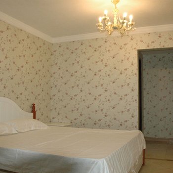 青岛金沙滩假日家庭公寓酒店提供图片