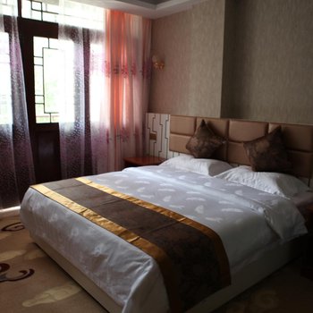 六盘水荷邑之雨主题酒店酒店提供图片