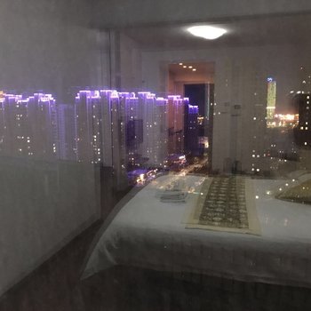 青岛暖暖酒店式公寓海南路店酒店提供图片