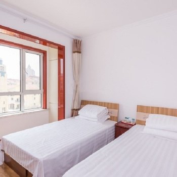 青岛金沙滩青果度假公寓(S399(金沙滩路)分店)酒店提供图片