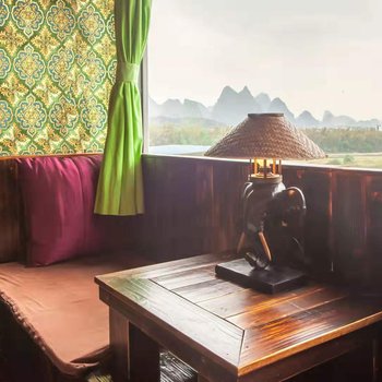 桂林漓江边的泰式小屋酒店提供图片