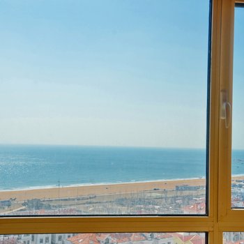 青岛金沙滩前排海之恋海景公寓酒店提供图片