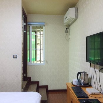 犍为鑫悦居商务旅店