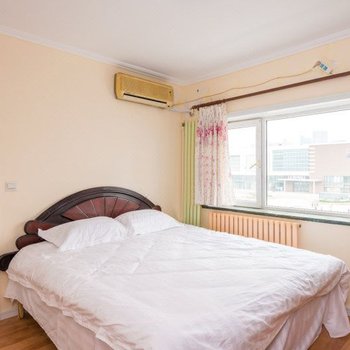 青岛石老人浴场三居室温馨家庭公寓（原石老人温馨家园家庭公寓）酒店提供图片