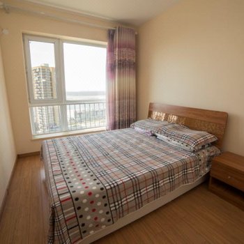 鲅鱼圈万科海港城小白酒店式公寓酒店提供图片