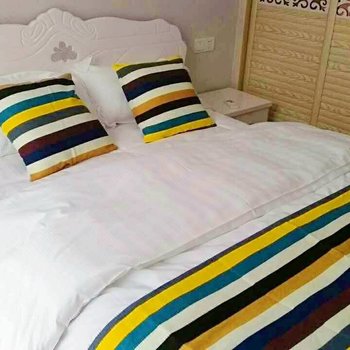 峨眉山市爱e家酒店式家庭公寓(食为天美食街店)酒店提供图片