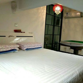 葫芦岛月光shanxiaozhuo特色民宿(腾达路分店)酒店提供图片