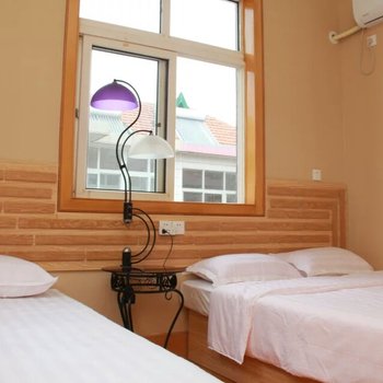 青岛友情客栈崂山风景区店酒店提供图片