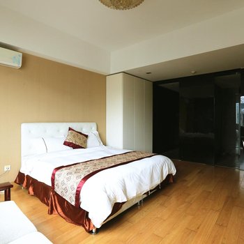 青岛芭特洛英式管家服务公寓(会展中心石老人海水浴场店)酒店提供图片