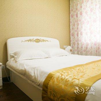 青岛金沙滩假日家庭公寓酒店提供图片