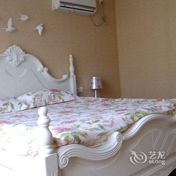 青岛金沙滩假日家庭公寓酒店提供图片