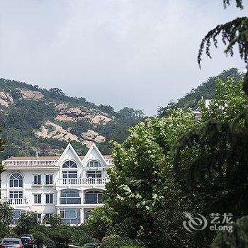 青岛芒豆的暖屋酒店提供图片