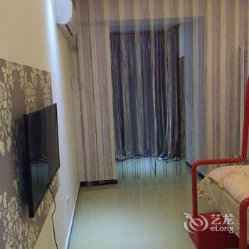 唐山沐浴阳光主题公寓万达店酒店提供图片