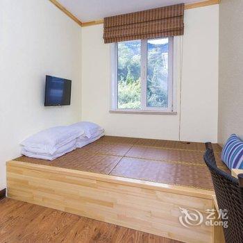 青岛芒豆的暖屋酒店提供图片