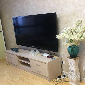 青岛金沙滩假日家庭公寓酒店提供图片