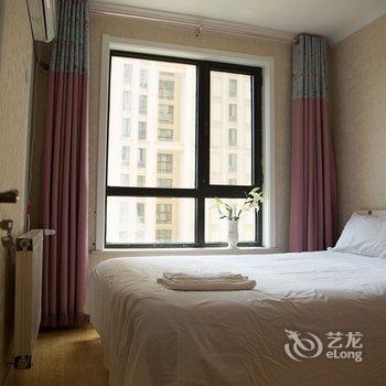 青岛金沙滩假日家庭公寓酒店提供图片