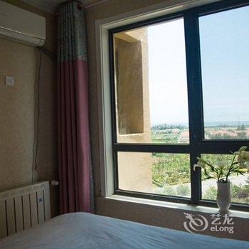 青岛金沙滩假日家庭公寓酒店提供图片