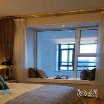 青岛金沙滩假日家庭公寓酒店提供图片