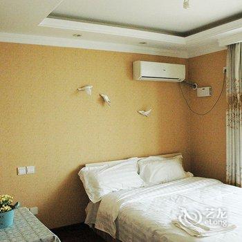 青岛金沙滩假日家庭公寓酒店提供图片