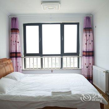 青岛金沙滩假日家庭公寓酒店提供图片