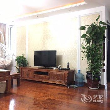 青岛金沙滩假日家庭公寓酒店提供图片