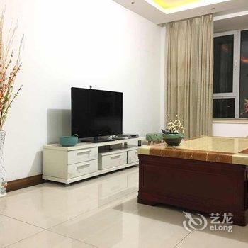 青岛金沙滩假日家庭公寓酒店提供图片