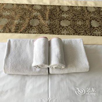 青岛暖暖酒店式公寓海南路店酒店提供图片