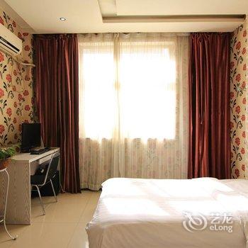 河津美立房主题酒店汾滨街店酒店提供图片