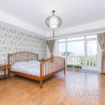 青岛芒豆的暖屋酒店提供图片