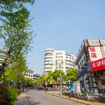 绍兴在这里单身公寓汇金店酒店提供图片