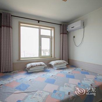葫芦岛东戴河的家特色民宿(碧海路分店)酒店提供图片