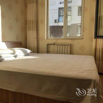 青岛蓝色凤凰4居室普通公寓酒店提供图片